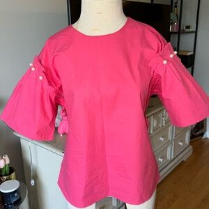 Lovely pink blouse with pearls